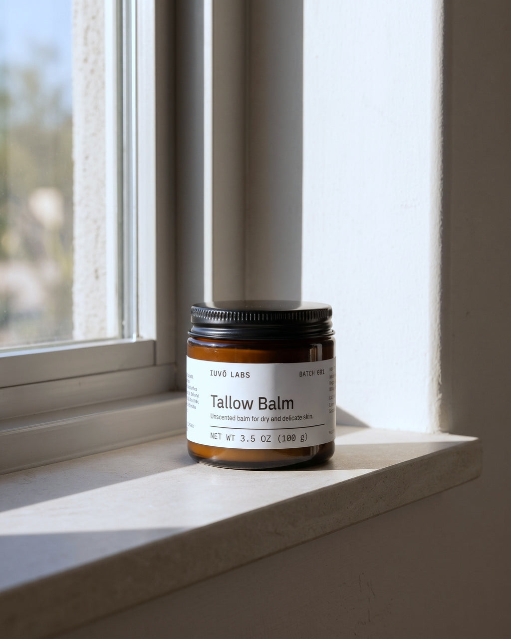 Tallow Balm on a sunny windowsill